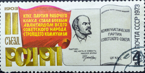 Postage stamp 'A party card and red flag' printed in USSR. Series: '70th Anniversary of Second Congress of RSDWP' by artist A. Kalashnikov, 1973
