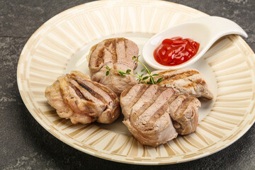 Grilled pork tenderlion with tomato sauce