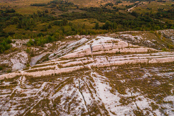 Phosphate gypsum waste from factories, creating artificial white mountains, attractive tourist view.