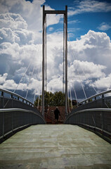 An urban bridge and sky with clouds