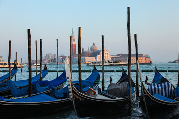 Gondolas in Venice at sunset.
