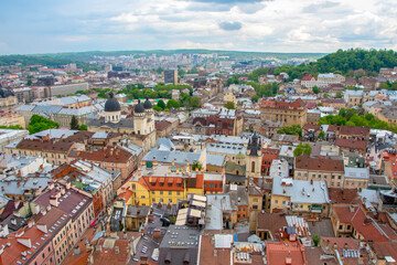 Fototapeta na wymiar Texture of urban old roofs of a European city, top view.