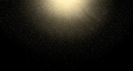 Sunbeams and Shining particles on black background. Stardust stock photo
