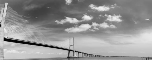 Papier Peint photo Pont Vasco da Gama Vasco da Gama bridge in Lisbon, Portugal  cable stayed bridge flanked by viaducts and rangeviews that spans the Tagus river in Parque das Nacoes, the second longest bridge in Europe