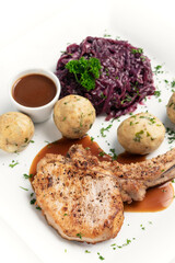 Naklejka na ściany i meble german style grilled pork chop with bread dumplings traditional meal