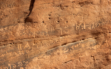 ancient nabataean inscription on the mountains in Wadi Rum, Jordan.