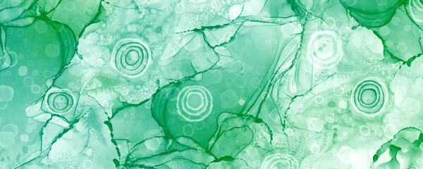 Green abstract fluid art painting in alcohol ink technique. Mix of colors create transparent wave. For posters, invitation and other. 