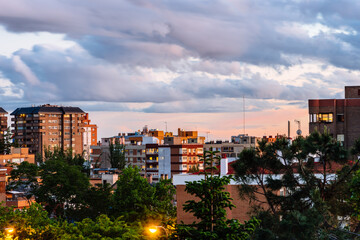 Residential District in Madrid. Arturo Soria Street in Ciudad Lineal. View at sunset