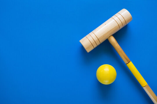 Croquet Mallet and Yellow Ball