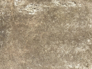Surface texture of natural building solid gray strong concrete, rough cement with small pebbles. The background