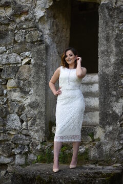 Beautiful young girl posing in the old town