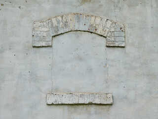 Textured background in the form of an old arched window