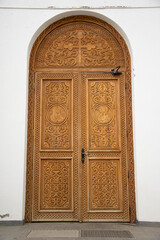 large wooden door at Dumbrava Monastery, Alba, ROMANIA, 2021,