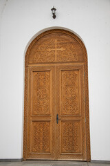 large wooden door at Dumbrava Monastery, Alba, ROMANIA, 2021,