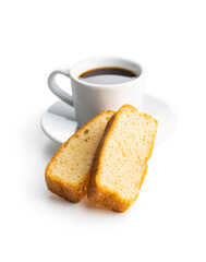 Sliced sponge dessert. Sweet sponge cake and coffee cup