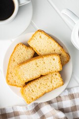 Sliced sponge dessert. Sweet sponge cake