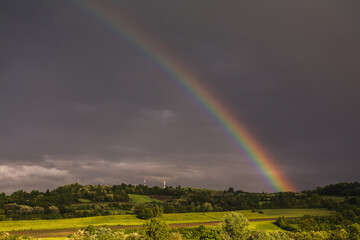Rainbow in the sky over the rural regia in the western Serbia