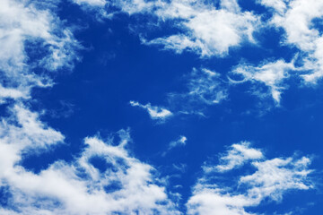 White clouds in blue sky, full frame