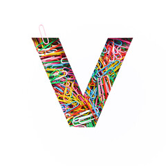 Letter V of English alphabet of colourful rainbow paperclips, white cut paper sheet. Typeface of stationery