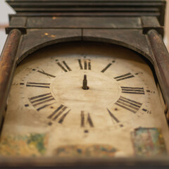 Antique wall clock without arrows.
