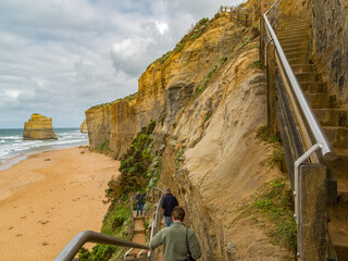 People Walking Down the Gibson Steps to Twelve Apostles Beach, Port Campbell National Park,...