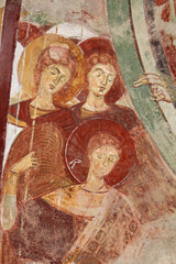 Fototapeta na wymiar l'Arcangelo Michele e altri angeli; affresco di stile bizantino nella chiesa romanica di San Michele a Oleggio