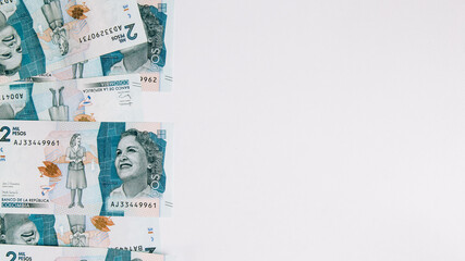 colombian money, two thousand pesos on white background