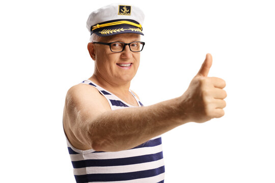Mature sailor man gesturing a thumb up sign