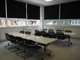 table and chairs in the meeting room in the office, in the classroom or in the library hall. White,...
