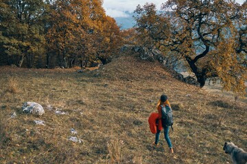 woman hiker nature walk autumn forest mountains