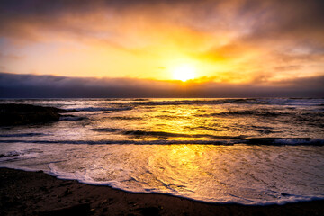 Fototapeta na wymiar Sunset at the Beach, Waves, Ocean, Clouds