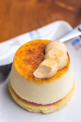 Creme brulee mini cheesecake tart on small plate