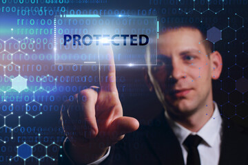 Business, Technology, Internet and network concept. Young businessman working on a virtual screen of the future and sees the inscription: Protected