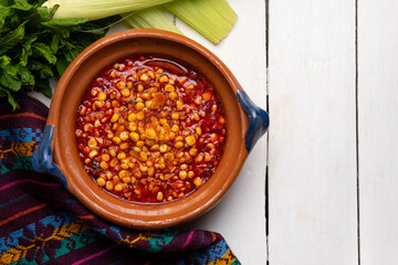 Red corn esquites on white background. Mexican food