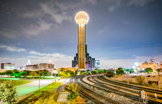 Iconic Observation Tower, Railroad Tracks and City Park at Night - Dallas, Texas, USA 