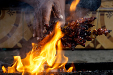 sate kambing on the fire