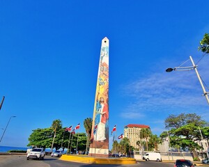 Dominican Republic Malecon Monument.  Color full blue sky