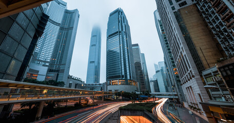 Hong Kong Business Downtown and Financial District, Modern Architecture of Skyscrapers Building at Twilight. Urban Cityscape With Illuminated Traffic Lights of Central Hong Kong. City Landscape