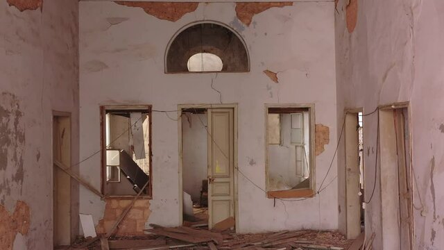 Beirut, Lebanon, 2020: day drone shot track in of the inside of a destroyed house due to the 4 August explosion