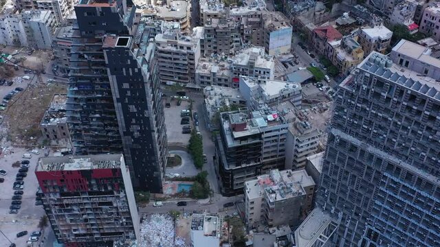 Beirut, Lebanon, 2020: day drone shot top view of the destructed buildings next to beirut port due to the 4 August explosion