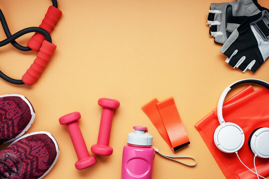 Bottle, sneakers and fitness workout or yoga equipment. Top view. Sport  concept. Flat lay. Copy space