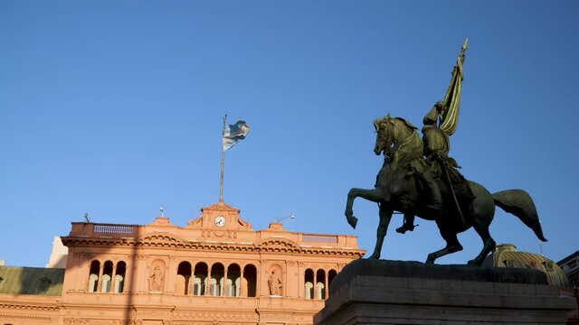 Low angle static view of General Belgrano's monument in front of the Presidential Palace, Buenos Aires.