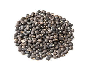 pile of raw whole black mung beans on white