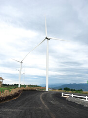 Fototapeta na wymiar wind turbine on the road