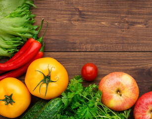 Selection of fresh products for preparing healthy and delicious vegetarian and vegan food. Various vegetables and fruits lie on the table. Flat lay.