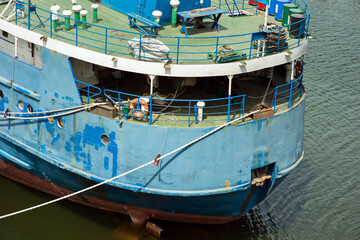 Fototapeta na wymiar Aft part of a dry cargo ship moored in the port