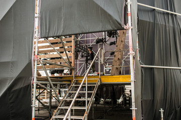 mobile stage for a concert in the city, back view, backstage entrance