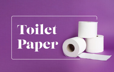 Rolls of soft toilet paper on color background