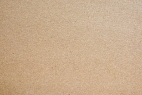 Old Kraft paper craft vintage pattern. brown recycled paper texture background
