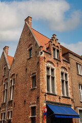 Fototapeta premium Facades and roofs of houses in the Gothic style. Bruges, Belgium